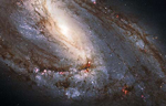 La galaxia espiral Messier 66, avistada por el telescopio Hubbel. | NASA | ESA