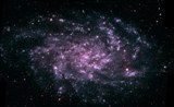 Imagen compuesta de la galaxia M33 vista por los instrumentos ultravioleta del \\\\