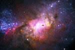 La galaxia Henize 2-10 y su agujero negro (señalado por una cruz). | NRAO/AUI/NSF,NASA, Reines et al.