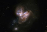 Ilustracin de las supernovas en la galaxia IC 694. | IAA.